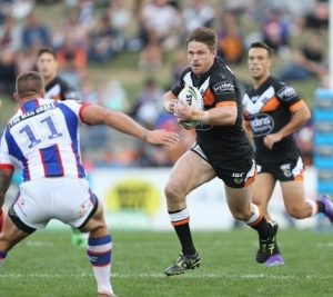 Chris Lawrence in action against the Newcastle Knights.