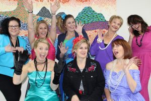 Youth Solutions team got into the spirit of its charity night theme, the 1980s.